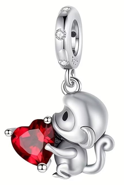 Monkey hugging heart charm