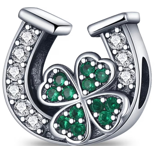 Horseshoe clover charm