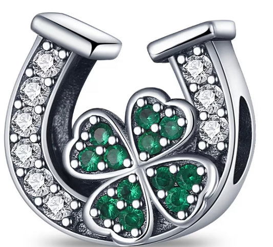 Horseshoe clover charm